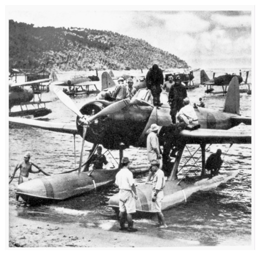 An Imperial Japanese Navy Aichi E13A seaplane, most likely from the seaplane tender Kamikawa Maru. Location of photo is unknown but may be at Deboyne Islands in May 1942 during the Battle of the Coral Sea [1].
