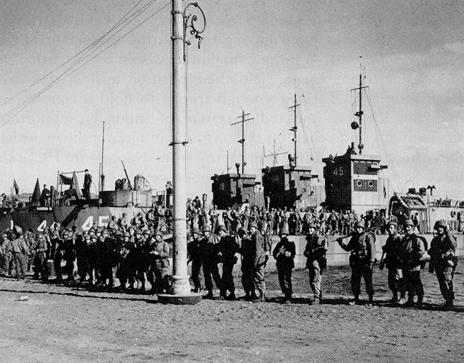 Photo: Soldiers of the 3d Ranger Battalion board LCIs that will take them to Anzio. Two weeks later, nearly all would be killed or captured at Cisterna (U.S. Army Photograph)