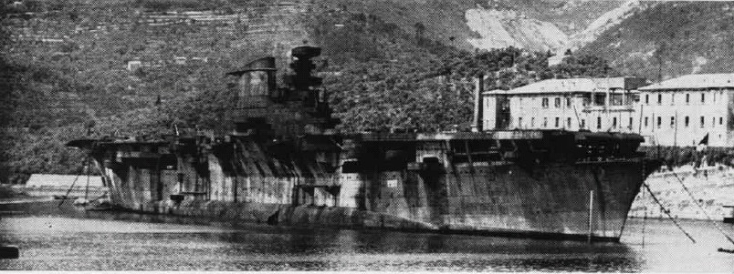 The never completed Italian aircraft carrier Aquila at anchor at La Spezia in June 1951.