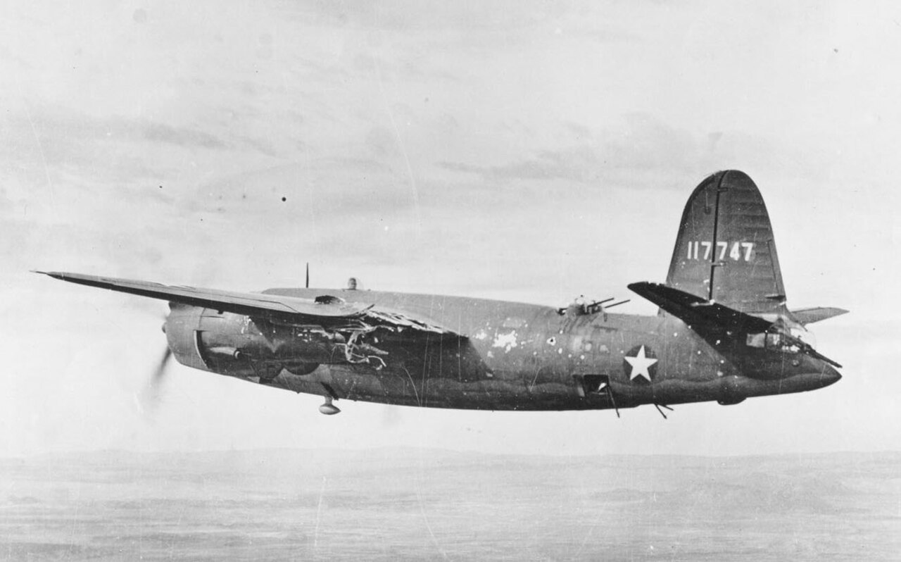 Martin B-26B-1-MA (S/N 41-17747) nicknamed "Earthquake McGoon" of the 37th Bombardment Squadron, 17th Bombardment Group with flak damage to the No. 1 engine nacelle, left wing and wheel well, in September 1943. Note the 