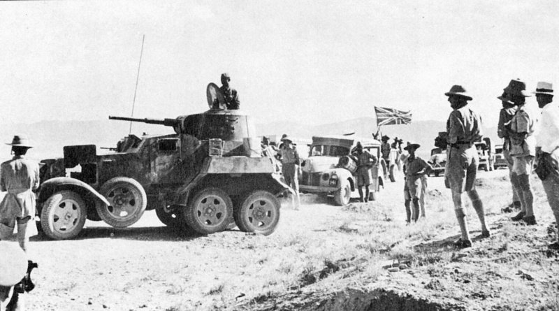 British supply convoy in Iran, headed by Soviet BA-10 armored vehicle. "Union Jack" waving on the background.