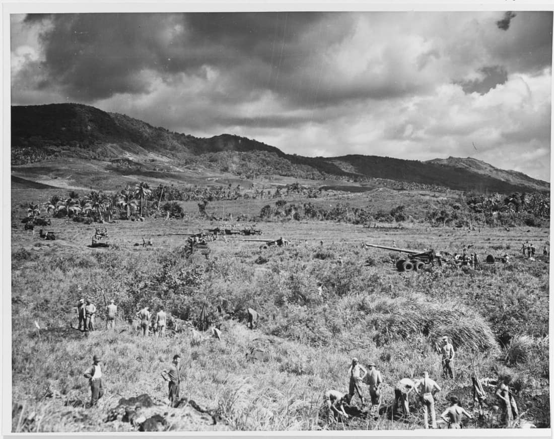 Title: Guam Invasion, 1944 Caption: Guam Invasion, 1944. 155mm guns of "A" Batty, 7th 155mm Battalion, 3rd Phib Corps Artillery, being set up 500 yards in from beach white two, in the Southern landing area, Guam, July 19