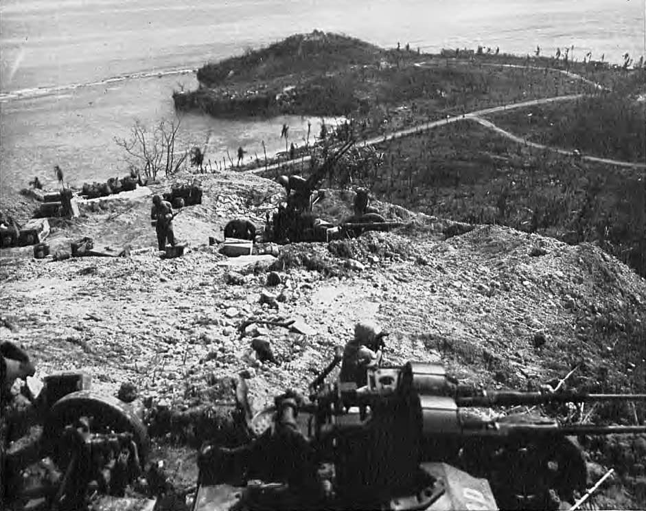 20 mm cannon of Battery I, 14th Defense Battalion emplaced atop Chonito Cliff ready to support the advance of