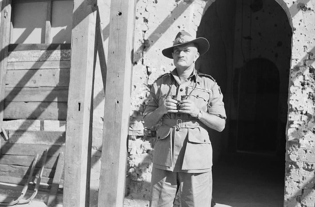Field Marshal Sir William Slim, General Officer Commanding Fourteenth Army in Burma, 5 March 1945. Field Marshal Sir William Slim: (1891 - 1970): GOC (General Officer Commanding) 14th Army, holding binoculars outside 14t