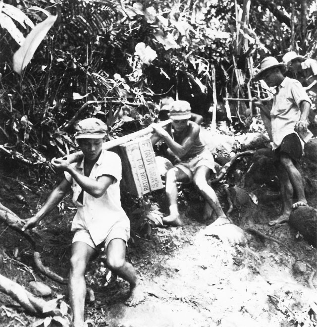 Filipino volunteers carry supplies into the mountains to reach 1st Cavalry Division troops in the battle of Leyte.From the National Archives via ibiblio.org. Downloaded from [1]
