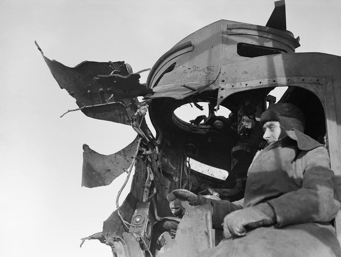 Damage to the director of the destroyer HMS SAUMAREZ which received a direct hit from an 11-inch shell during the Battle of North Cape, when the German battlecruiser SCHARNHOST was sunk on 10 January 1943. A close up of 