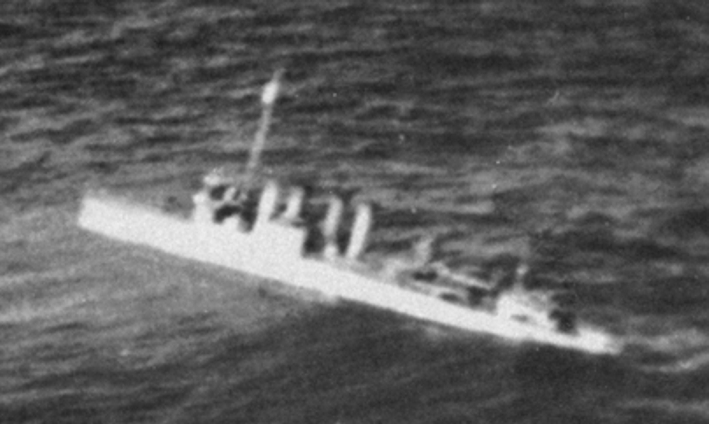 A U.S. Navy Clemson-class destroyer sinking during the Japanese Dutch East Indies Campaing, probably USS Pope (DD-225).