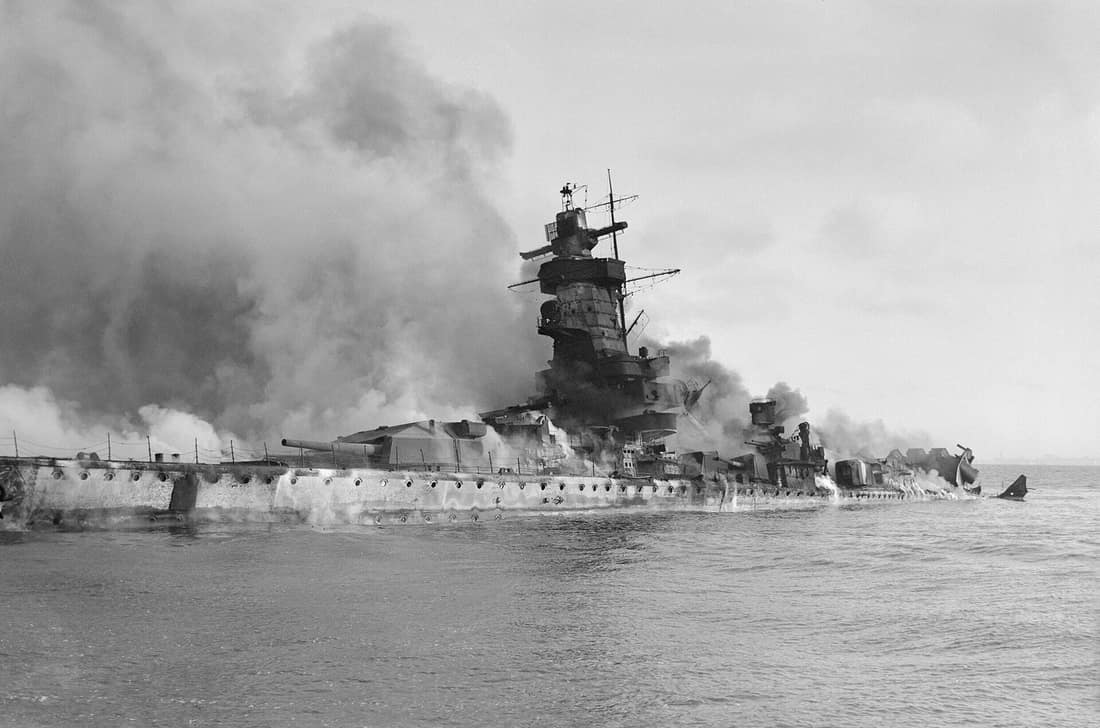 IWM caption : The German battleship Admiral Graf Spee in flames after being scuttled in the River Plate Estuary off Montevideo, Uruguay.
