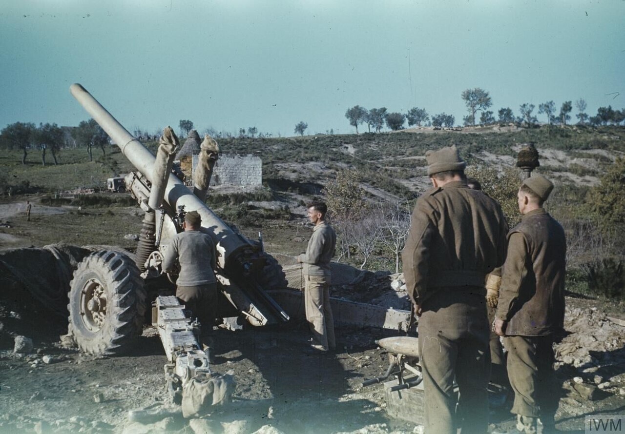 A 5.5 Inch Gun Crew on the Italian Front, 10 January 1944 The crew of the 5.5 inch gun await the order to commence firing, near Sessa Aurunca, Garigliano River Valley, Italy.