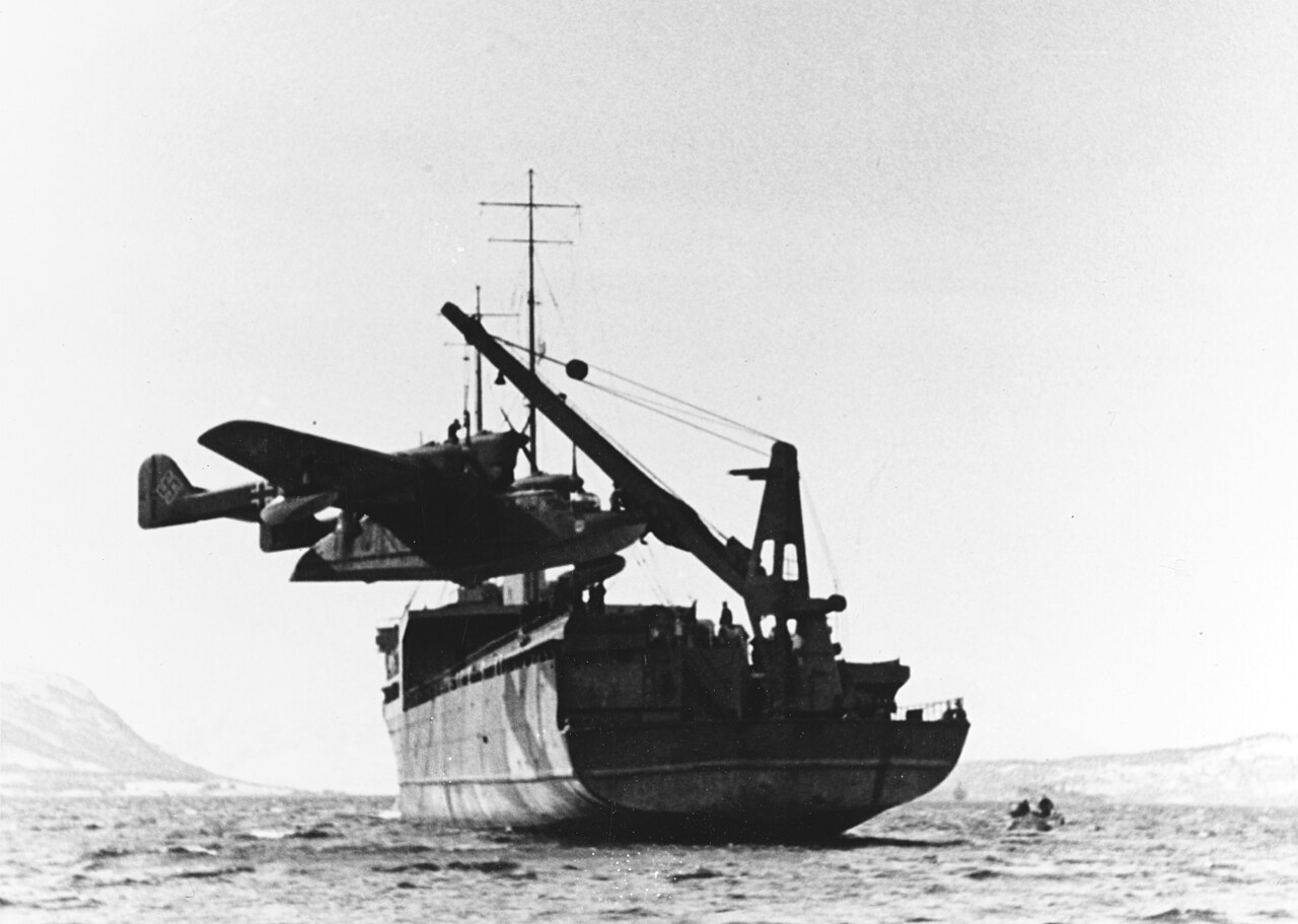 A German Blohm &amp; Voss BV 138 float plane being lifted aboard the German aircraft tender Friesenland, in Norwegian waters, during the Second World War.