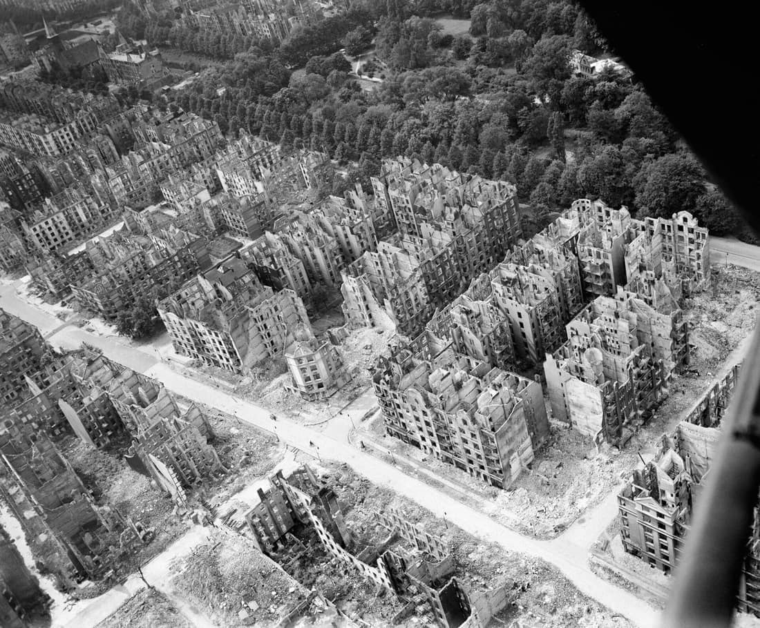 Royal Air Force Bomber Command, 1942-1945. Oblique aerial view of ruined residential and commercial buildings south of the Eilbektal Park (seen at upper right) in the Eilbek district of Hamburg, Germany. These were among
