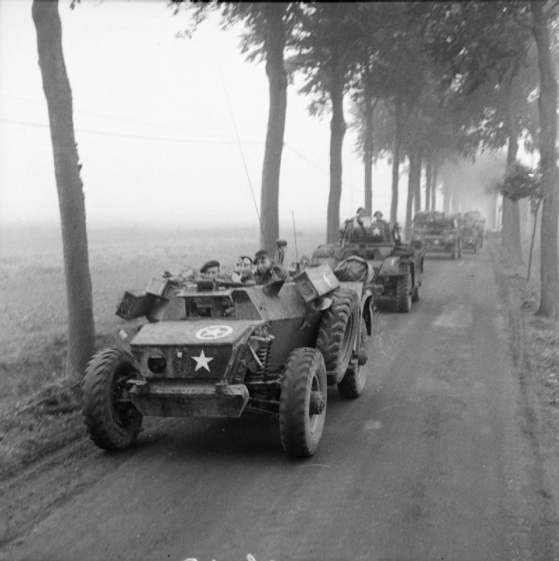 Daimler armoured cars and other recce vehicles on the road near Lille St Hubert (St Huibrechts), 20 September 1944.