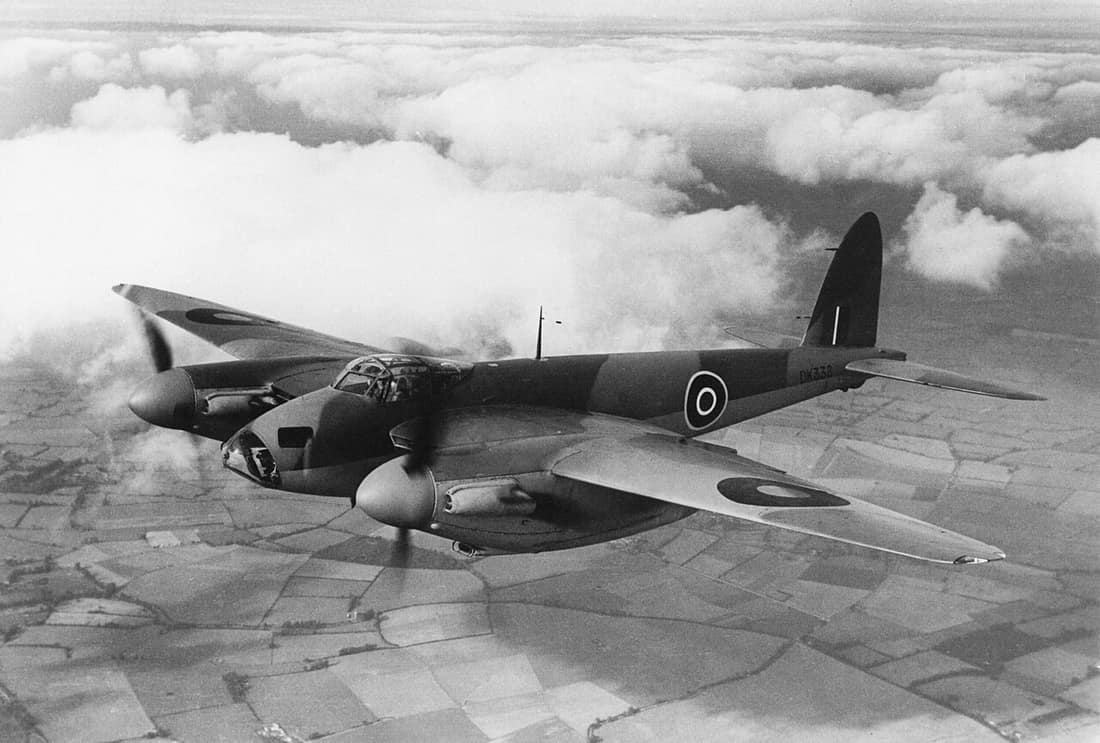 Air-to-air photograph of a De Havilland DH.98 Mosquito B Mk IV Series 2 bomber with No. 105 Squadron of the Royal Air Force in flight.