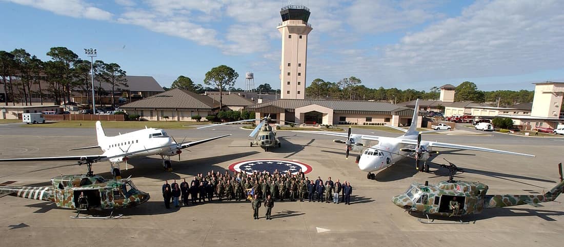 6th Special Operations Squadron and their aircraft. The two closest are UH-1Ns (69-6654, right); the white aircraft on the left is a C-47T Turboprop conversion (the USAF is still flying the C-47); the white plane on the 