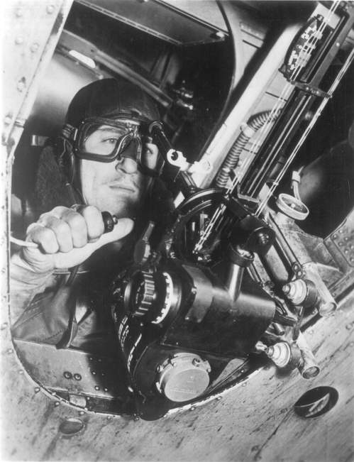 The Course Setting Bomb Sight, labeled as a Mk. IX but likely a Mk. VII, installed in the bottom of a Fairey Battle light bomber. The bomb aimer is sighting through the backsights (white rings just in front of him) and p