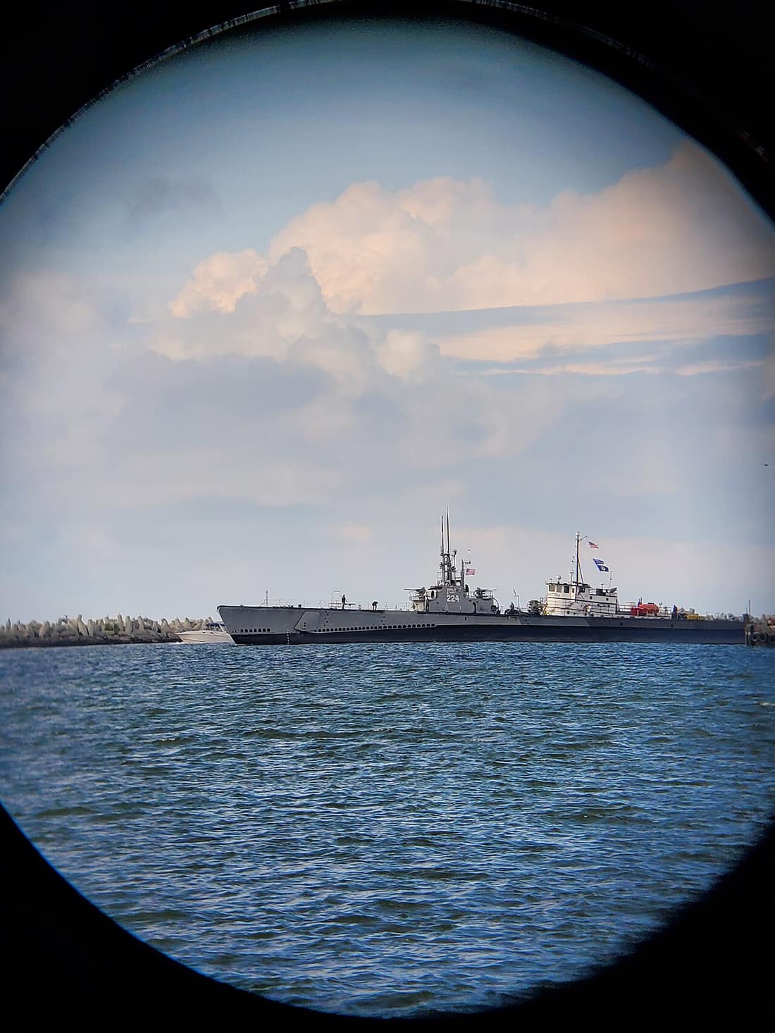 The Cod returns to Cleveland on 18 August 2021 after maintenance in Erie, aided by the tug Manitou.