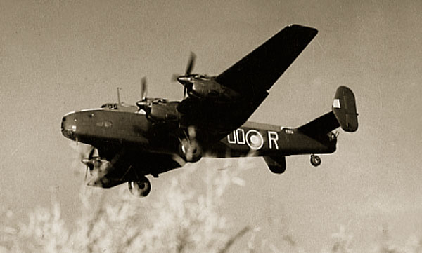 A Royal Air Force Handley Page Halifax B.V Series 1 (Special) (s/n EB151, "OO-R") of No. 1663 Heavy Conversion Unit based at Rufforth, Yorkshire (UK), getting airborne from RAF Holme-on-Spalding Moor, Yorkshire, during a