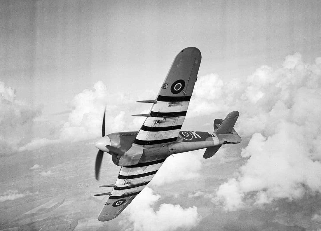 A Hawker Typhoon Mk IB of No. 486 Squadron RAF, 27 October 1943. Exhibiting its aggressive lines to advantage, Typhoon IB JP853/SA-K of No. 486 (NZ) Squadron RAF displays for the photographer during a visit to Tangmere, 