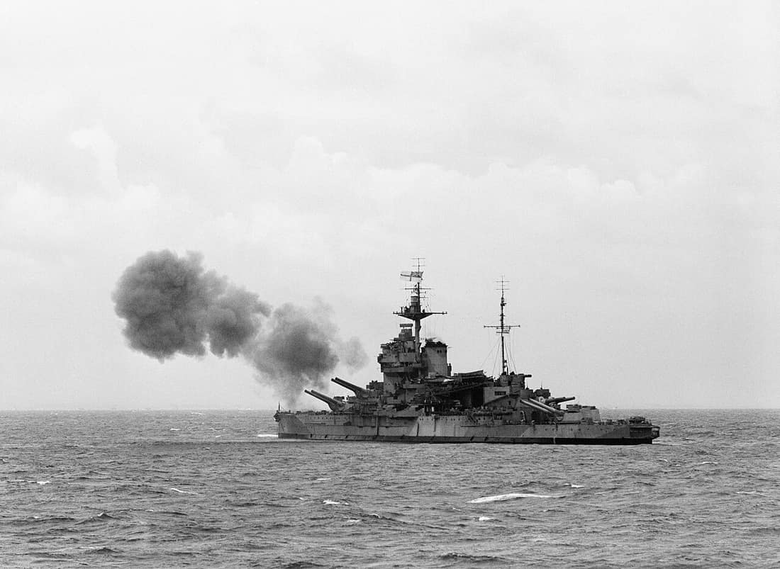 D-day - British Forces during the Invasion of Normandy 6 June 1944 HMS WARSPITE, part of Bombarding Force 'D' off Le Havre, shelling German gun batteries in support of the landings on Sword area, 6 June 1944. The photo w