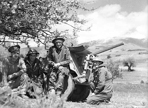 Members of the Australian 2/1st Anti-Tank Regiment resting, 13 April 1941, after their withdrawal from the Vevi area. The unit suffered heavy losses in the first German attacks on Australian positions in Greece.
