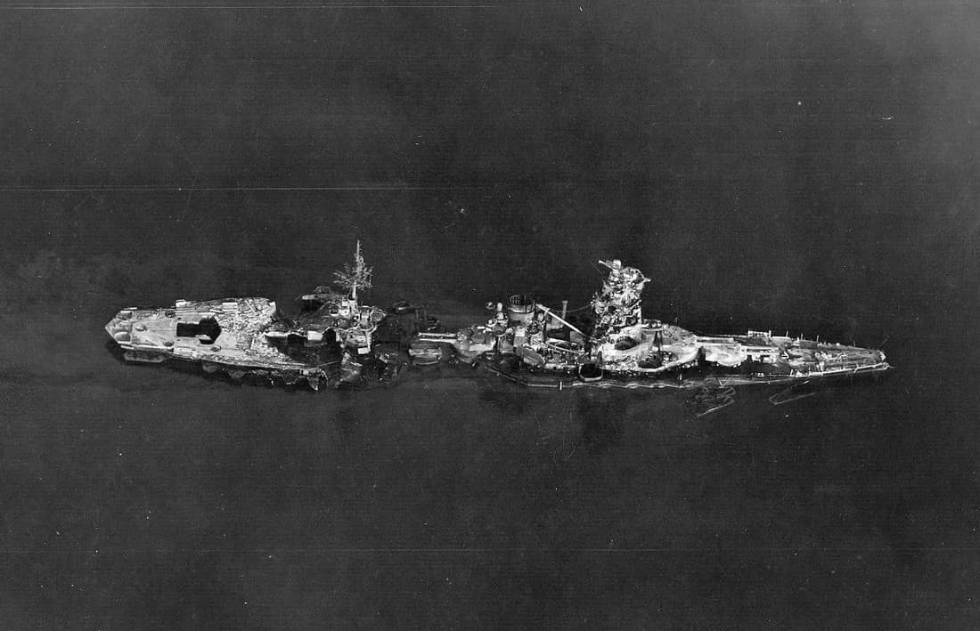The Japanese battleship Hyūga, pictured after being heavily damaged during air attacks by carrier planes against Kure, Japan.