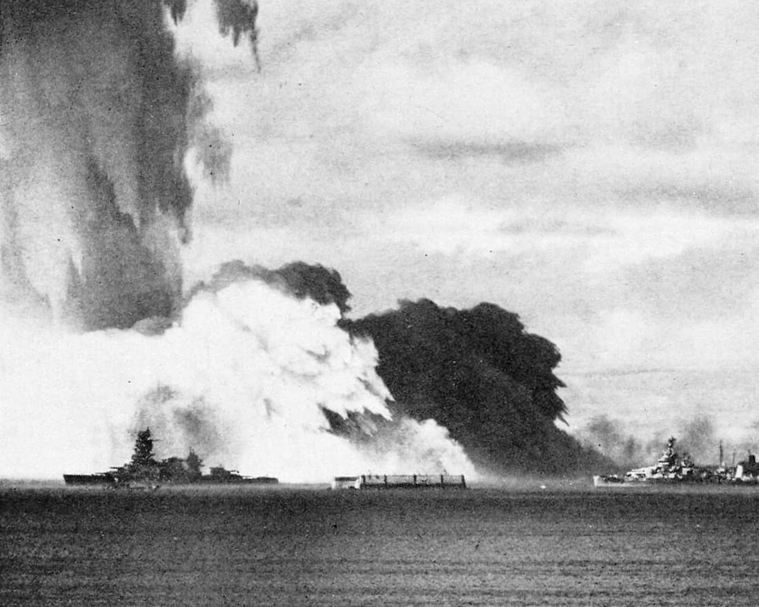 The Baker shot of Operation Crossroads, Bikini Atoll, July 25, 1946. As the spray column collapses a 900-foot-tall "base surge" of radioactive mist envelops the target ships. Ship in the foreground (left) is the Japanese