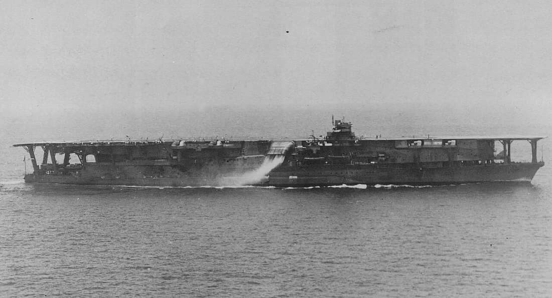 Imperial Japanese Navy Carrier Kaga: photo taken after her massive refitting. Its smokestack is directed downwards to extinguish the smoke with seawater.
