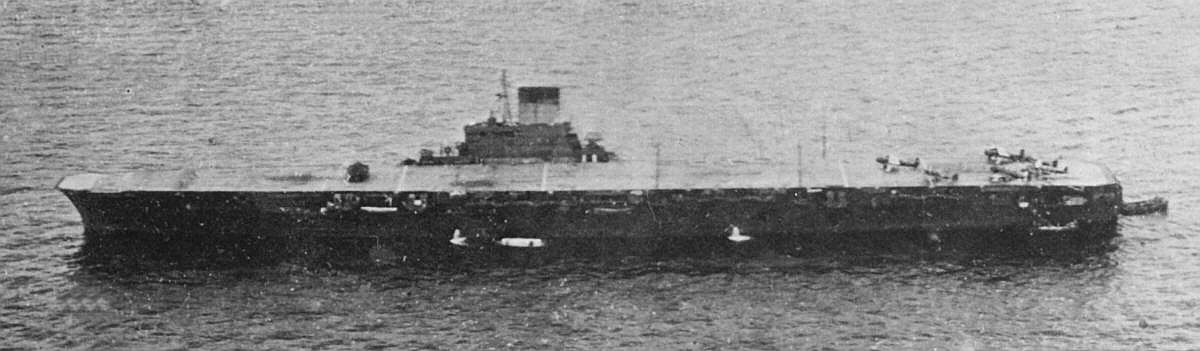 Japanese Aircraft Carrier HIJMS Taiho anchored in Tawi-Tawi, the Philippines (May 1944).