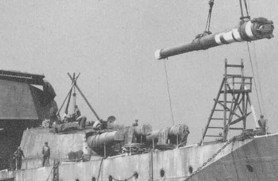 14 inch gun being installed (in the turret at left) on Japanese battlecruiser Haruna at the Kawasaki company at Kobe, Japan