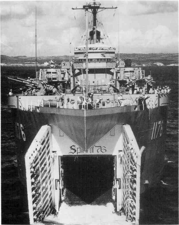 USS Graham County (LST-1176) beached at Vieques, Puerto Rico, in 1964. Note her bow door configuration, 3"/50 twin gun mounts, and radar-equipped gun directors. US Naval Historical Center. Official US Navy photo taken fr