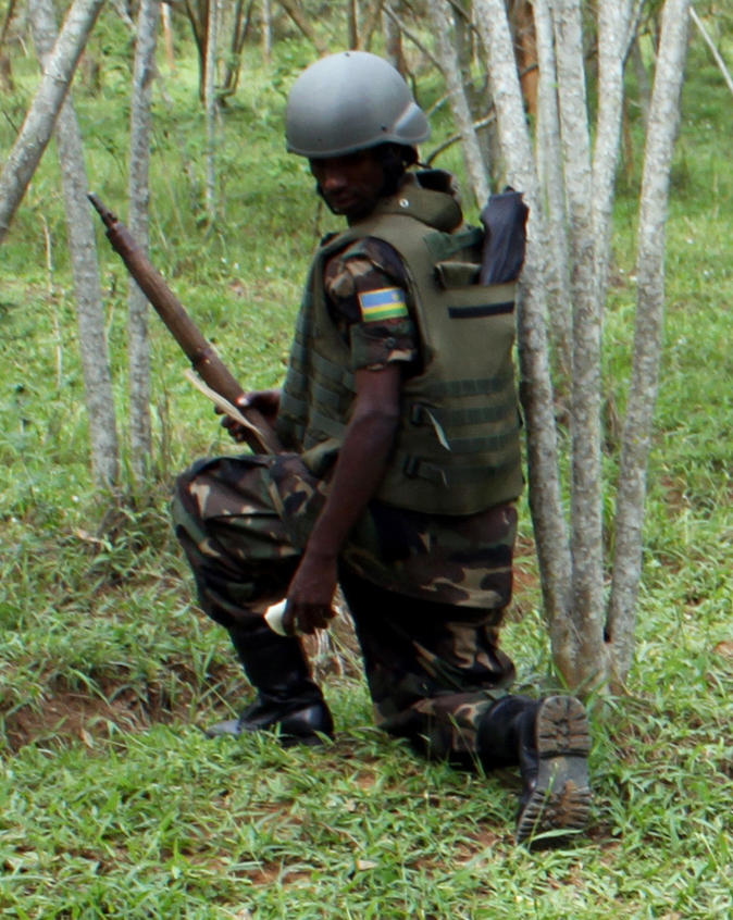 A Rwandan Defense Force (RDF) soldier provides medical support to a teammate simulating an injury during a combat life saver course held March 19-26, 2011 in Gako, Rwanda. U.S. Army photo by Spc. Austin Drake RDF soldier