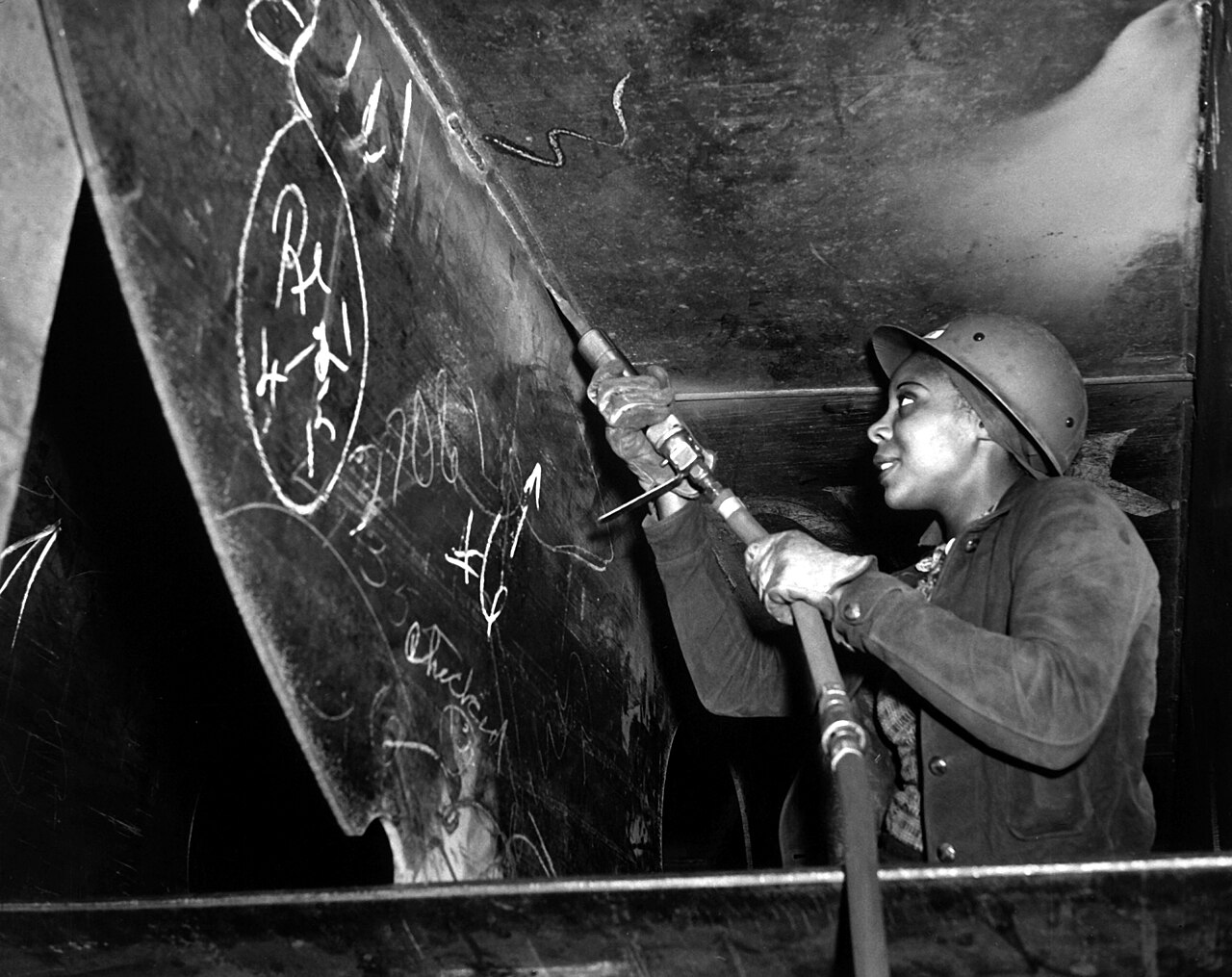 Miss Eastine Cowner, a former waitress, is helping in her job as a scaler to construct the Liberty ship SS George Washington Carver