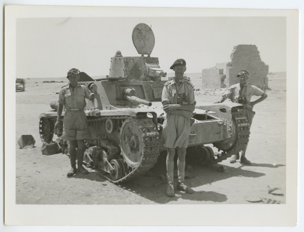 <a href="http://www.catalog.slsa.sa.gov.au/record=b3019412" rel="nofollow">SRG 435/2/95</a> Three soldiers standing by a tank. Note on back: 'Wop tank MII captured near Sidi Barrani seen whilst on recce to Fw