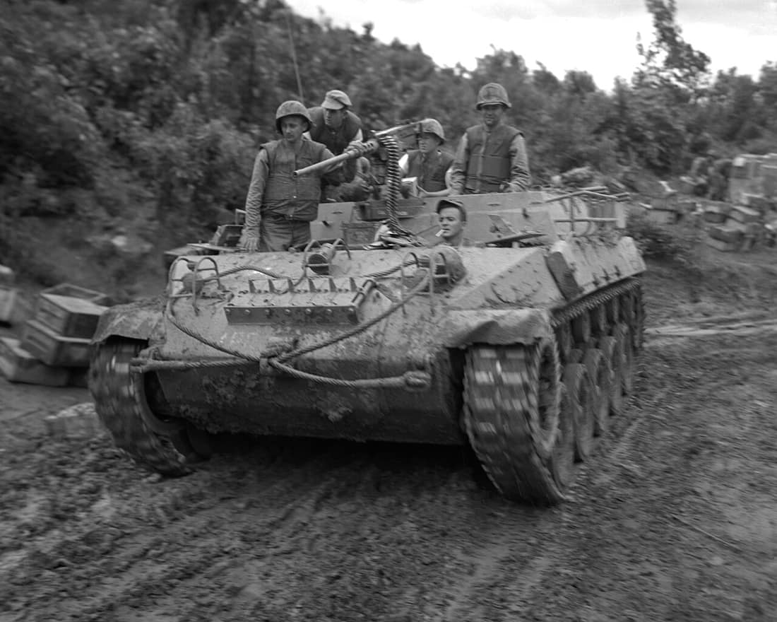 FIGHTING IN BERLIN SECTOR - An APC moves up to 3rd Battalion, 1st Marines to pick up casualties during an attack against Boulder City in Korea. NARA FILE #: 127-GK-234D-A173808