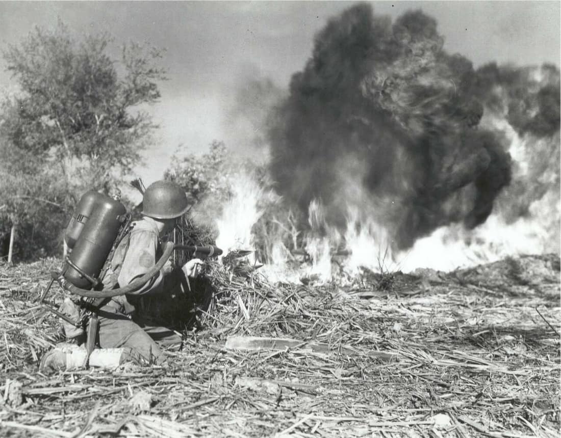 S/Sgt Bill Seklscki fires a flame thrower at a Japanese position near Manacag, Luzon, P.I., Jan 25 1945, National Archives. Note: Since 33rd did not land on Luzon until Feb 1945, this date could be a mistake.