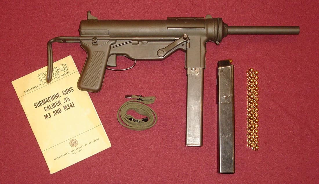 World War II era Guide Lamp M3 Submachinegun with 30-round magazine and other accessories. The Buffalo Arms bolt in this original M3 is dated January 1944.
