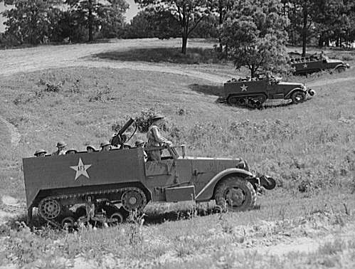 M3 Halftrack armored cars Fort Knox. Three halftrac armored cars move in formation as soldiers in training at Fort Knox, Kentucky practice some new methods in the art of mechanized warfare. Capable of rapid travel over d