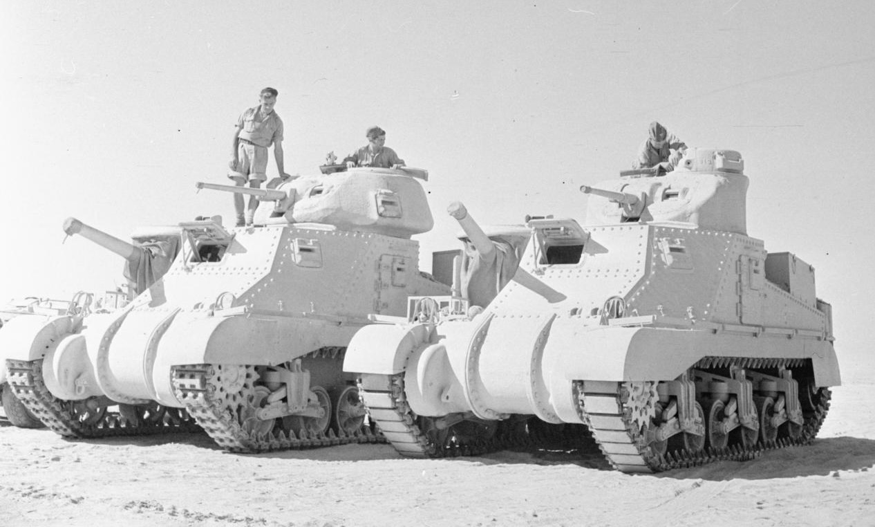 Grant and Lee tanks of 'C' Squadron, 4th (Queen's Own) Hussars, 2nd Armoured Brigade, El Alamein position, Egypt, 7 July 1942. Photographer: No 1 Army Film &amp; Photographic Unit