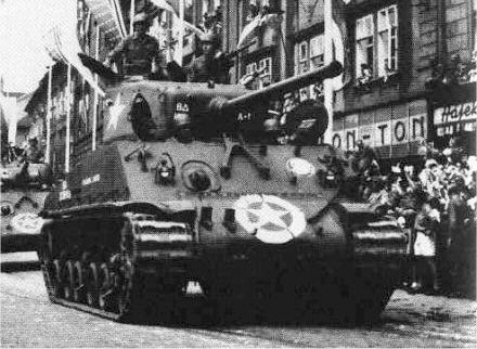 Official US Army photo - 8th Armored Division M4A3(76)W tank in the town of Pilzen in a Victory Parade, 1945.