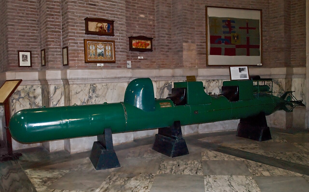 A Siluro a lenta corsa (Italian for Low speed torpedo), also known as maiale (“pig”), Italian manned torpedo. The pictured one is exposed at the was an Italian human torpedo — Museo Sacrario delle Bandiere delle Forze Ar