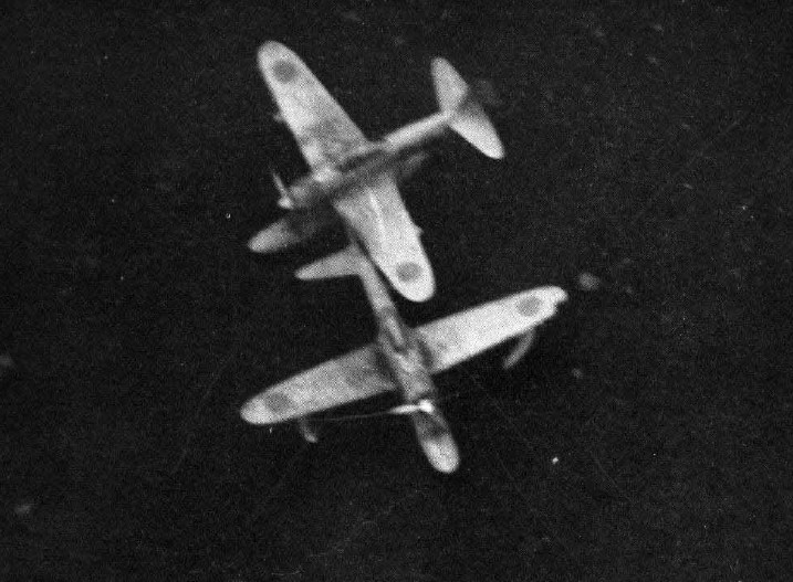 A U.S. Navy reconnaissance photo of two Japanese Nakajima A6M2-N Rufe seaplane fighters at Holtz Bay, Attu Island, Aleutian Islands (USA), on 7 November 1942, photographed by a USAAF plane. The left wing and float of the