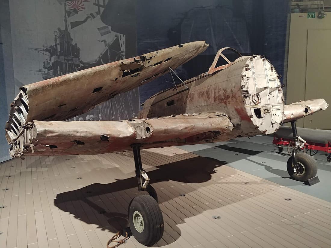 This example of a Nakajima B5N2 likely served in the Pacific Theater of WWII before being shot down or abandoned on a South Pacific island. Over the years, many parts were stripped from the plane by souvenir hunters befo