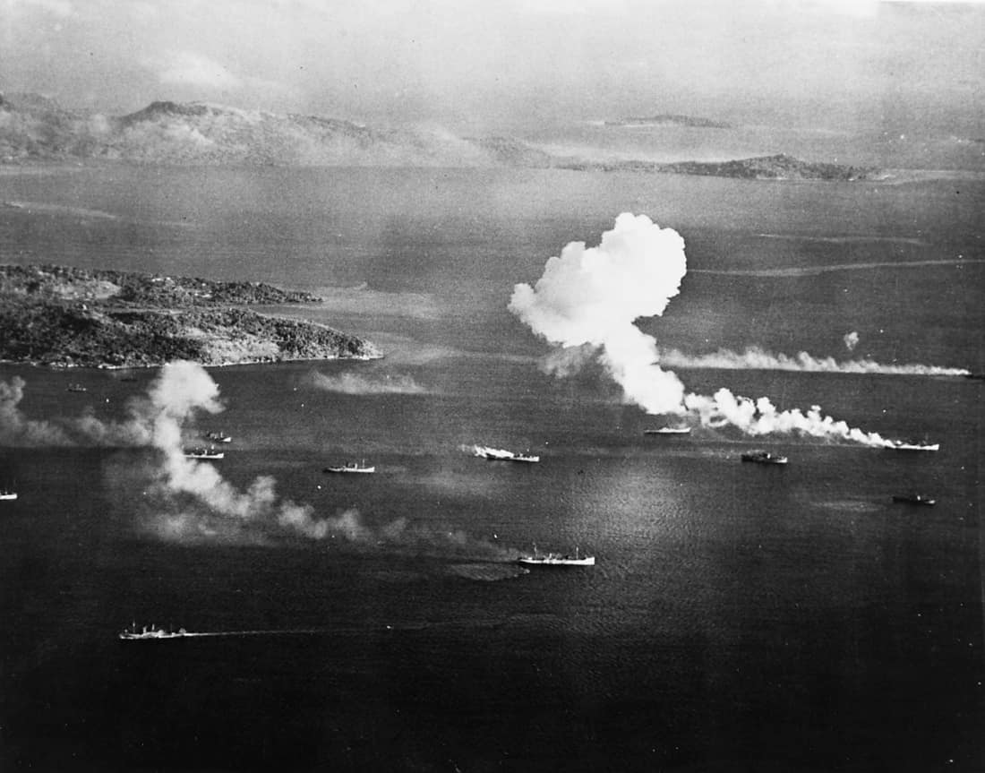 Japanese shipping under air attack in Truk Lagoon, as seen from a USS Intrepid (CV-11) aircraft on the first day of raids, 17 February 1944. Dublon Island is at left, with Moen Island in the background. Four of these shi