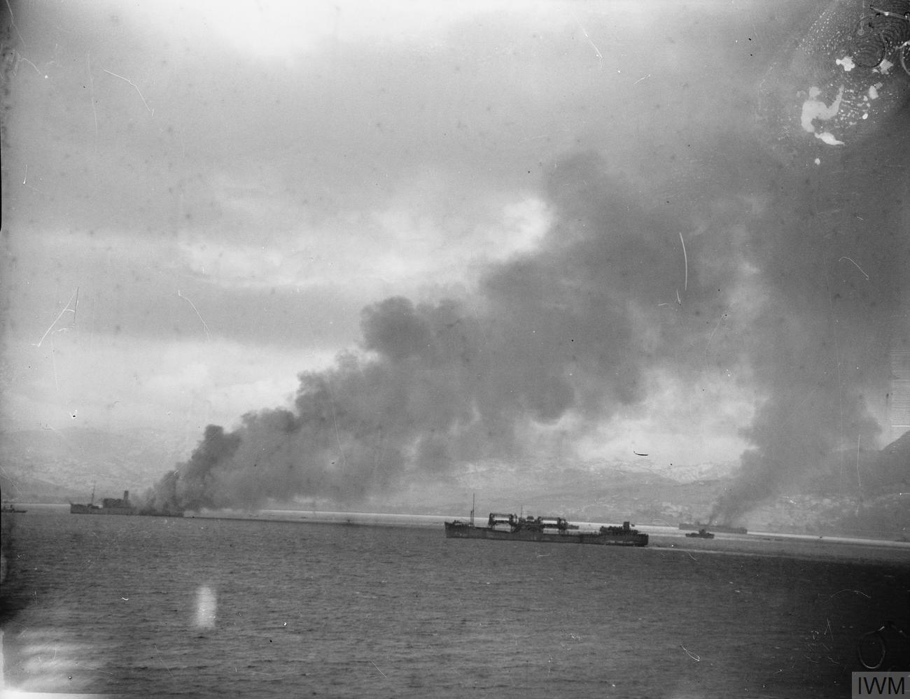 North Africa Operations. 12 November 1942, Bougie, North Africa. SS KARANJA and SS CATHAY on fire off Bougie.