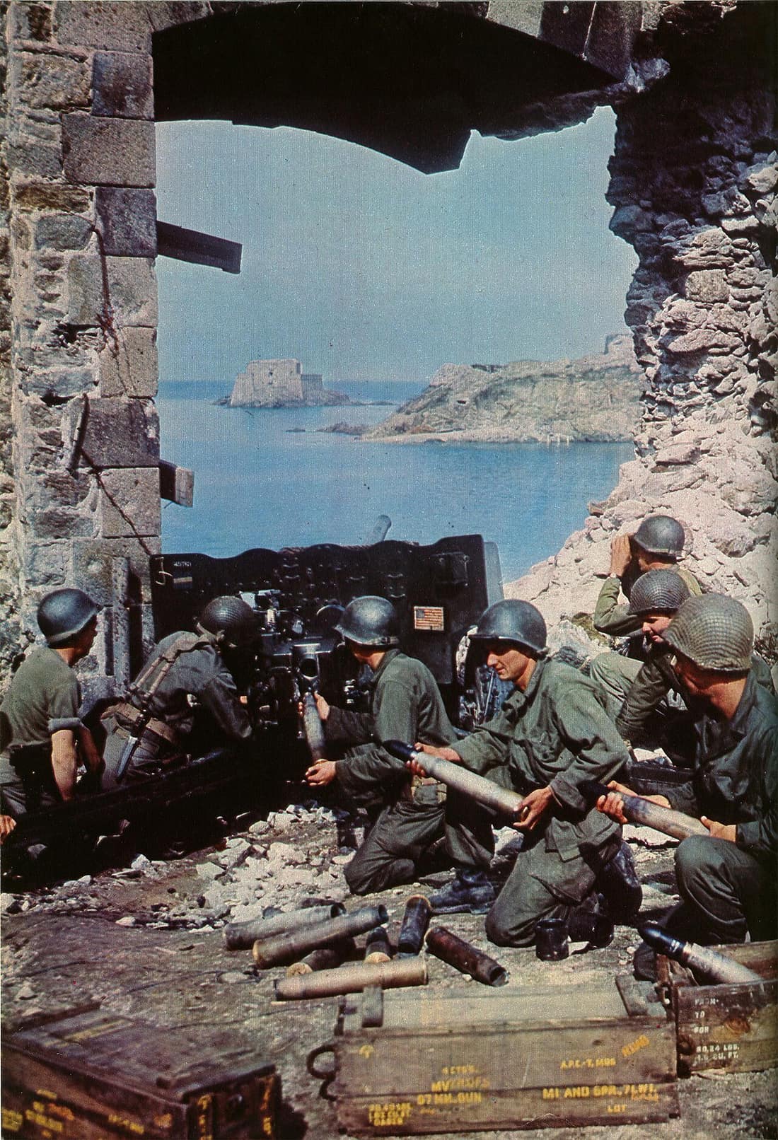 A U.S. 57 mm M1 gun firing from Champs-Vauverts gate in Saint-Malo intramuros, in Bretagne in August 1944. It seems to be a reconstructed scene for the movie needs of John Ford who followed Patton's army