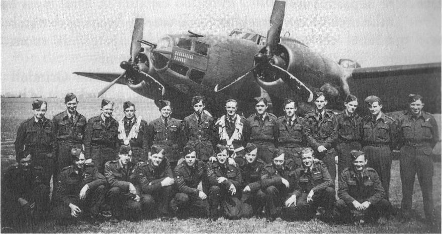 New Zealand non-commissioned aircrew serving with the RAF in No. 487 Squadron RNZAF at Methwold in front of Lockheed Ventura EG-A in early 1943.