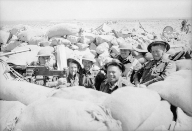 Soldiers of the Australian 2/48th Battalion man a defensive position near Tobruk in 1941