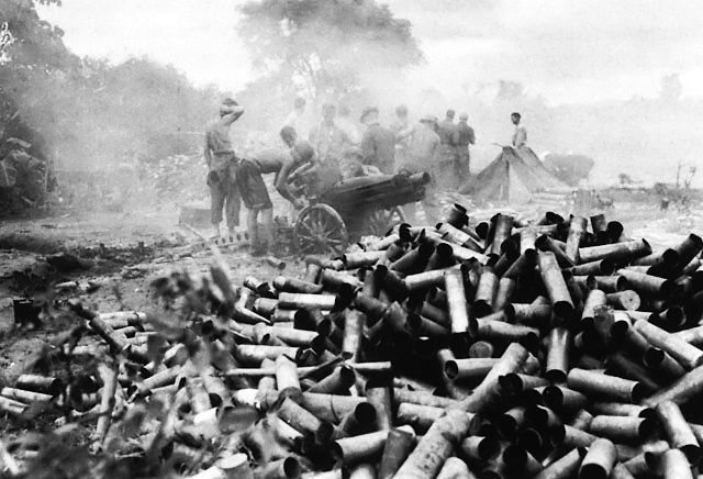 A 75-mm pack howitzer supports GALAHAD's siege operations at Myitkyina. Mid 1944