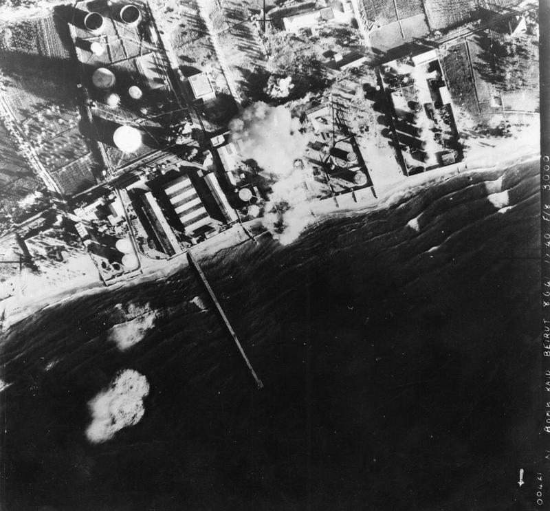 IWM caption : The Royal Dutch Shell oil depot near Beirut comes under a bombing attack from three Bristol Blenheims of No. 11 Squadron RAF, flying from Aqir, Palestine, at the start of Operation EXPORTER.