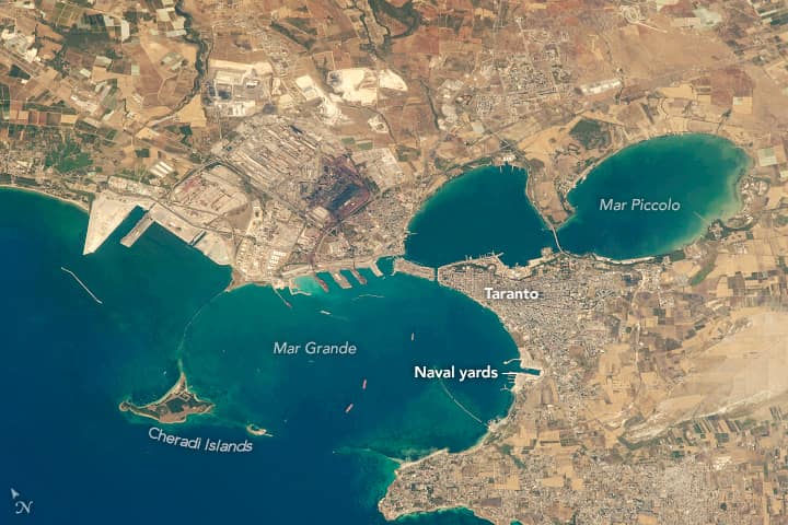 Looking down from the International Space Station on the Italian coastline through a powerful (1150 millimeter) zoom lens, an astronaut shot this detailed photograph of the city of Taranto. It is Italy’s major southern p